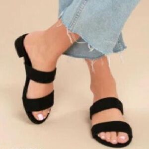 Black sandals with gold accent